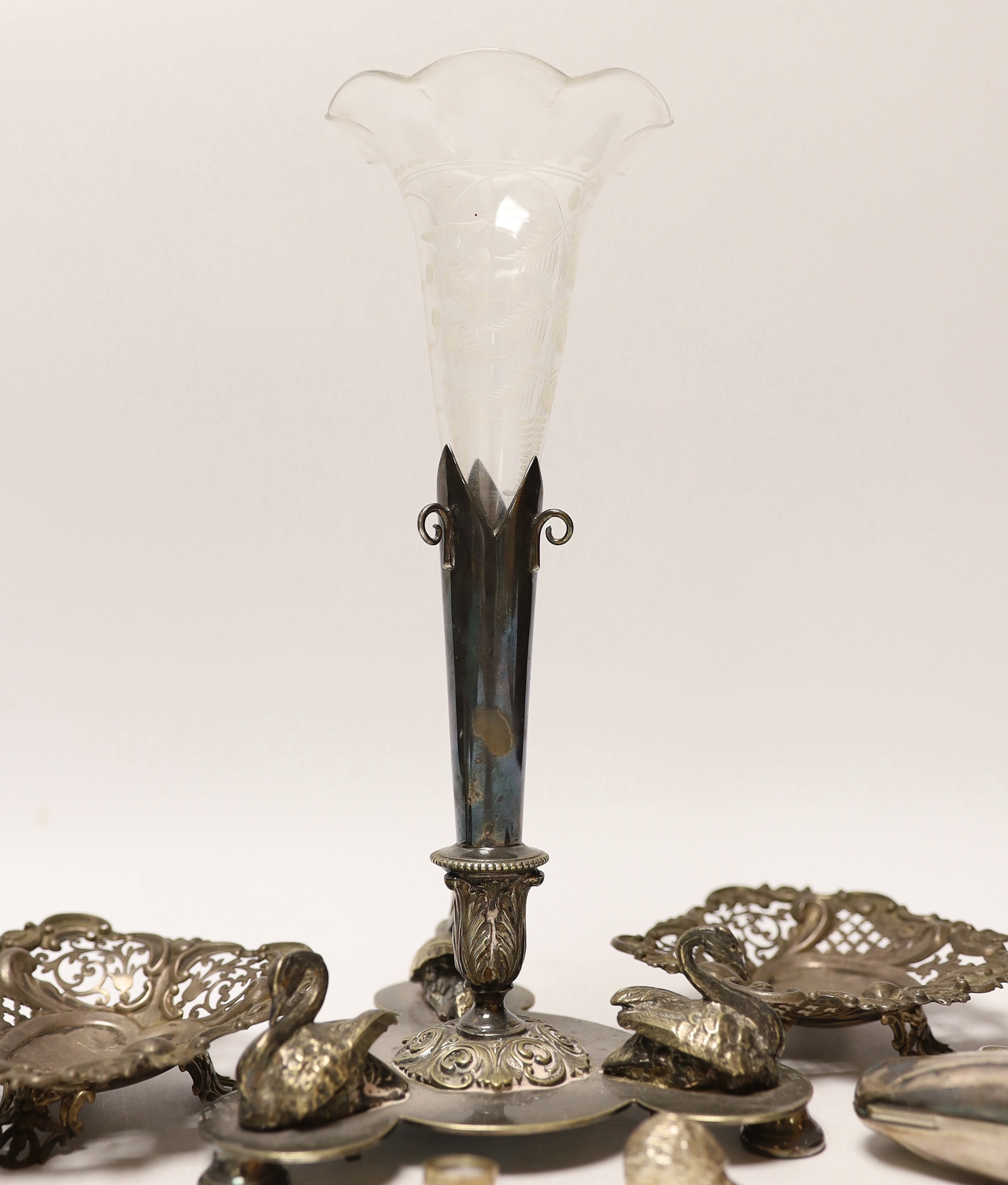 A pair of Edwardian pierced silver bonbon dishes, four other modern silver items and a plated centrepiece with glass vase.